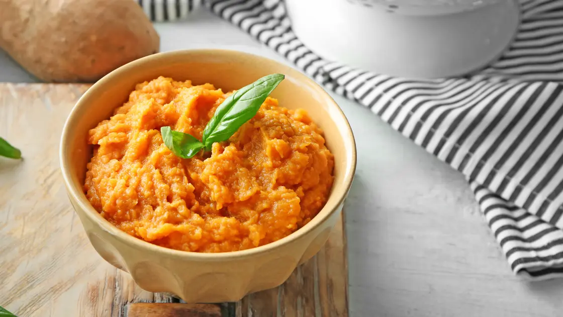 picture of a bow with carrot, squash and potatoes smash for a thanksgiving side dish